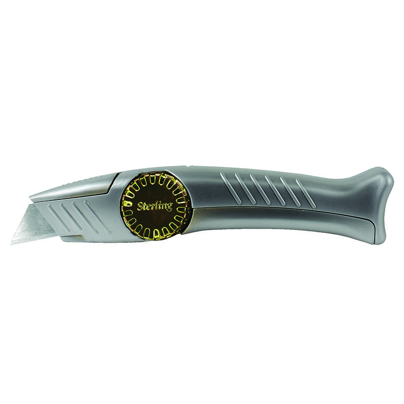 Retractable utility knife held in profile with a silver handle and a round tension dial near the blade side.