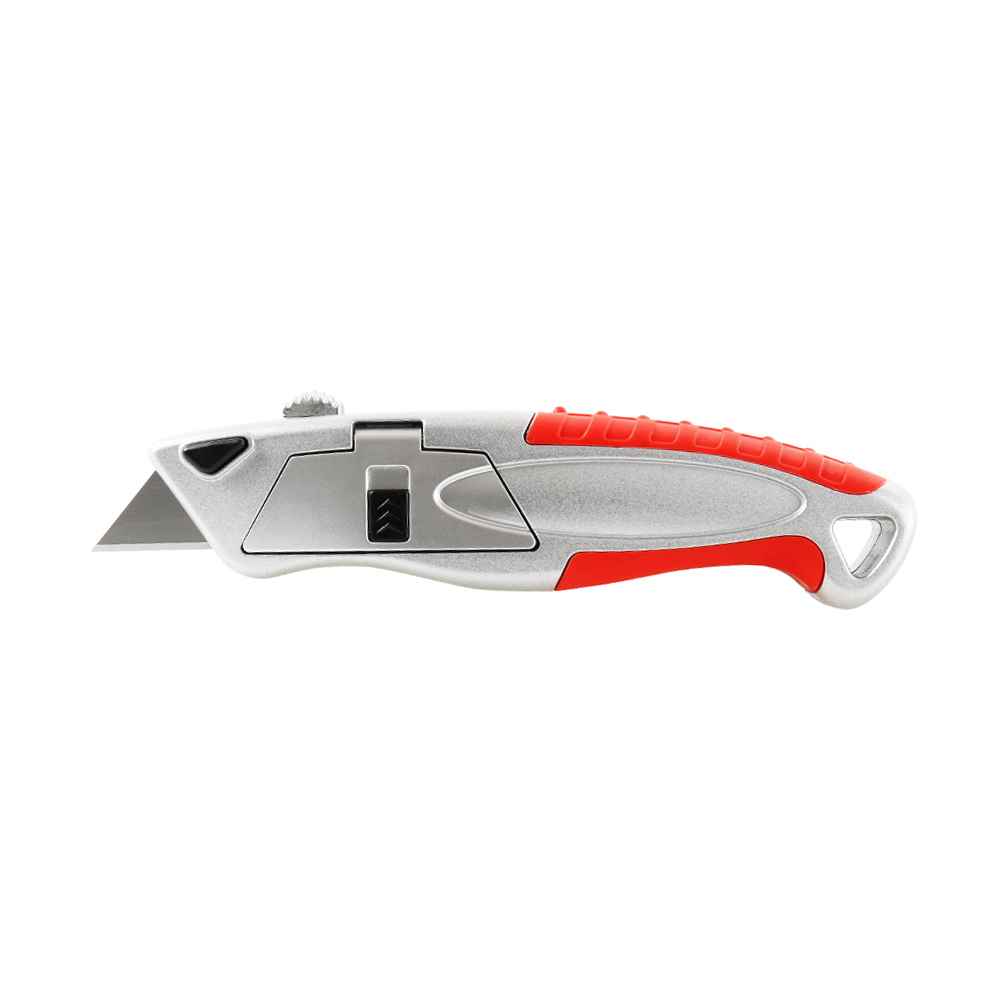 Retractable utility knife with silver body and red grip, blade extended slightly forward to cut materials.