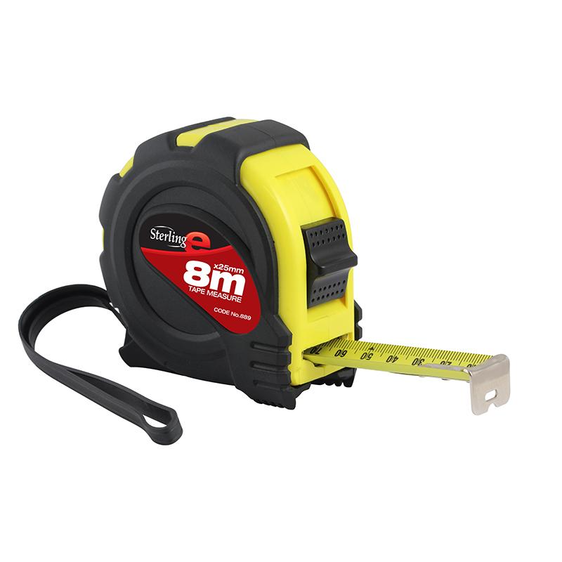 Black and yellow retractable tape measure with metal tape extended for measuring, showing the lock button and wrist strap on the side of the case.